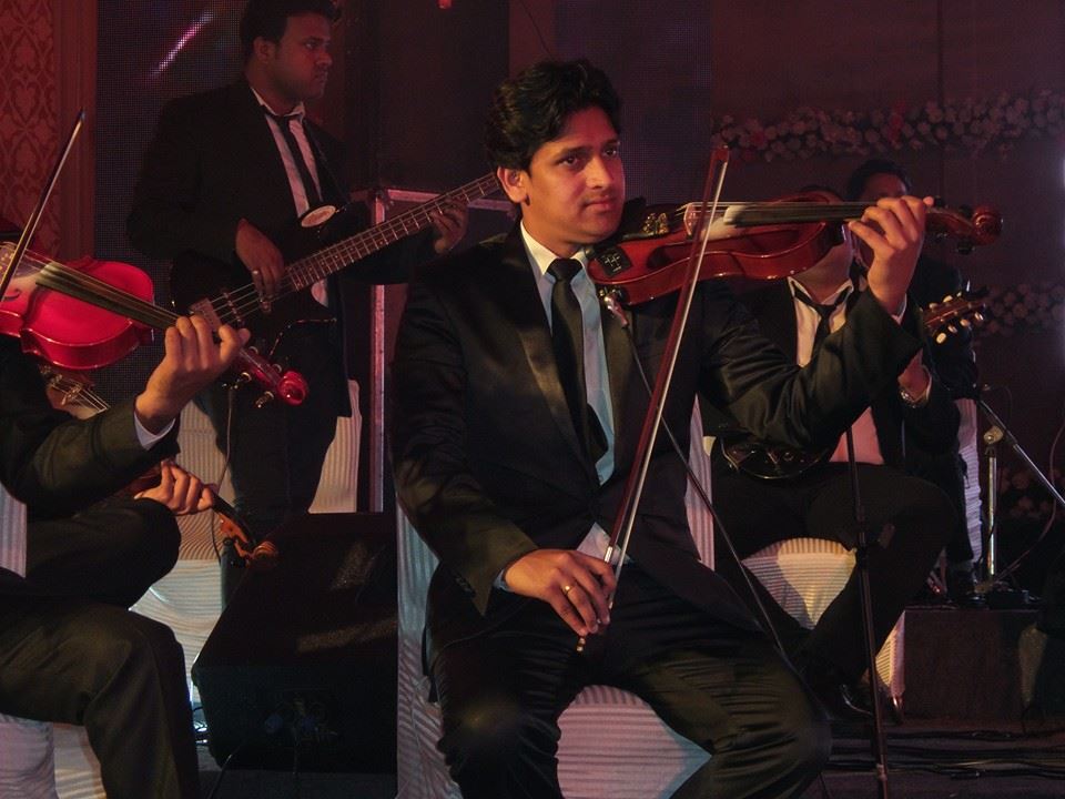 male violin player gurgaon